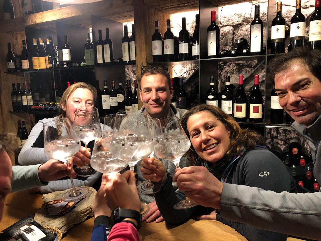 The group tasting the 8025 gin in the cave of Baita Sofie in Seceda. Photo: Claudia Rier. Lunch at Baita Sofie in Seceda, Val Gardena, Dolomiti Superski, Sudtirol.