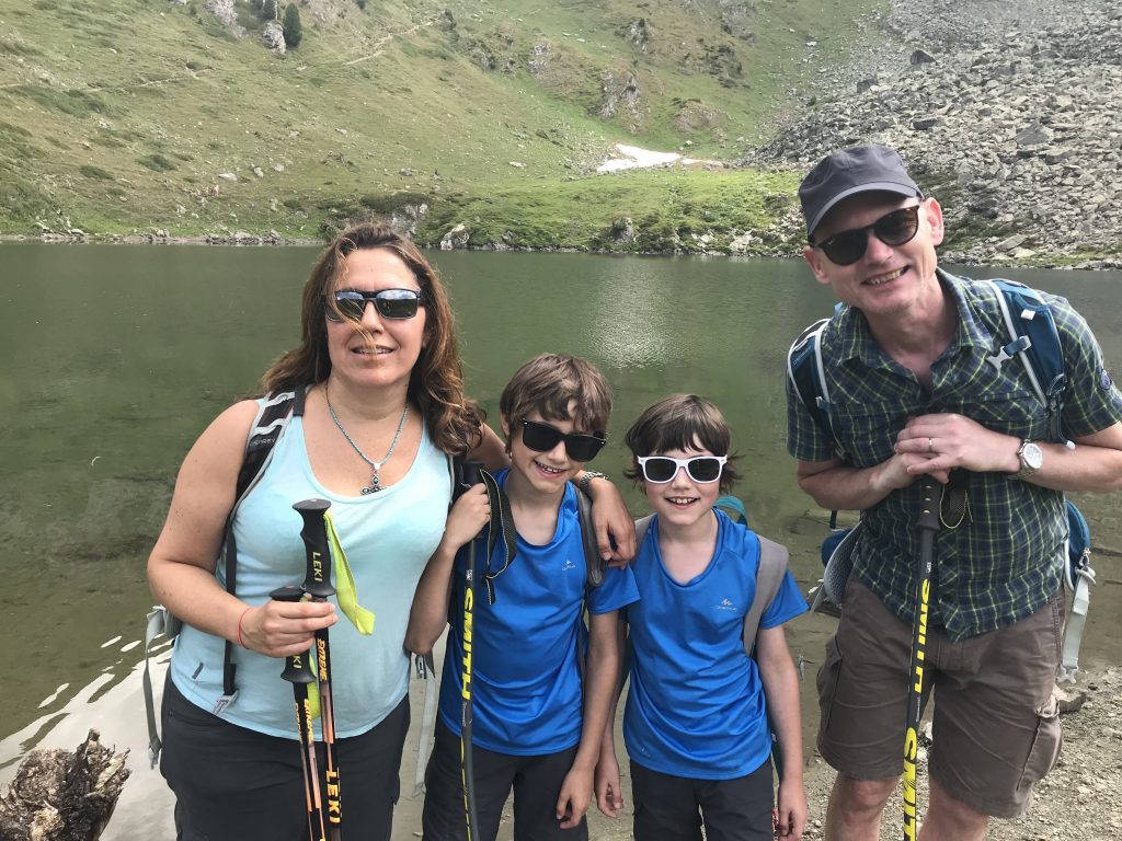 The family by Lago Chamolé in Pila, Aosta Valley. Your shopping guide to mountain hiking apparel and equipment.