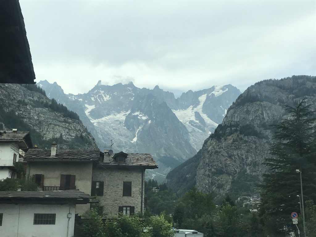 The Rochefort group with the distinctive Dent de Gént viewed from Courmayeur. An ‘ephemeral lake’ appeared on the Mont Blanc massif due to warm record temperatures.