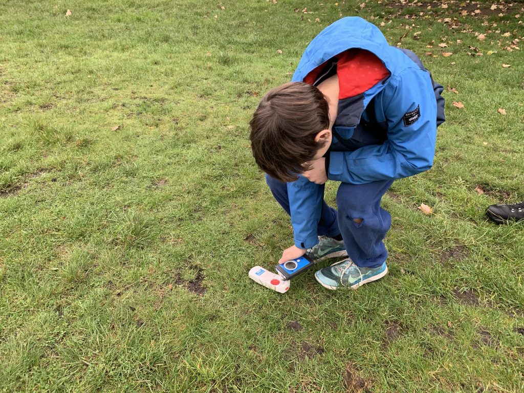 My son learning the basics of finding a transceiver on the snow. Henry's Avalanche Talk course on Wimbledon Common.