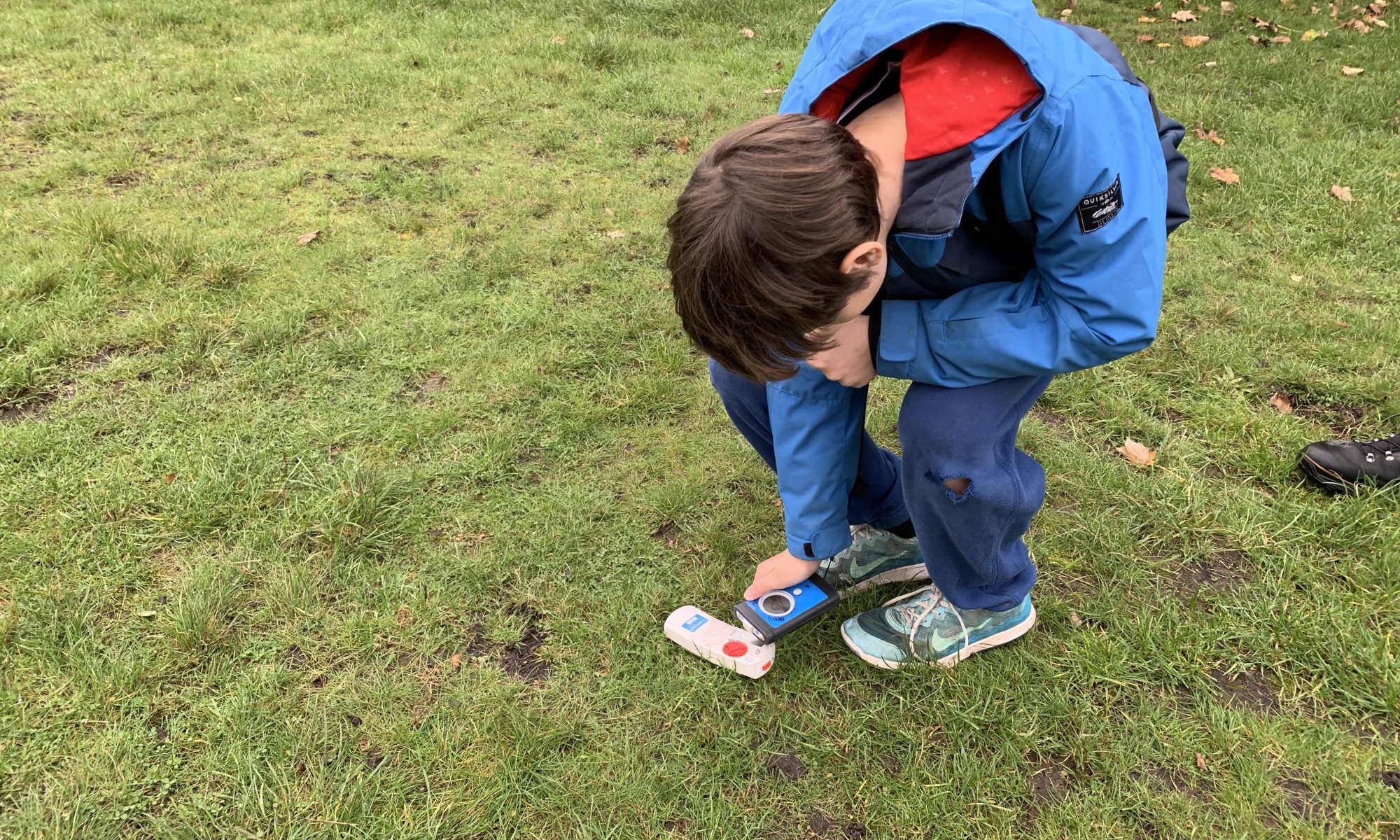 My son learning the basics of finding a transceiver on the snow. Henry's Avalanche Talk course on Wimbledon Common.