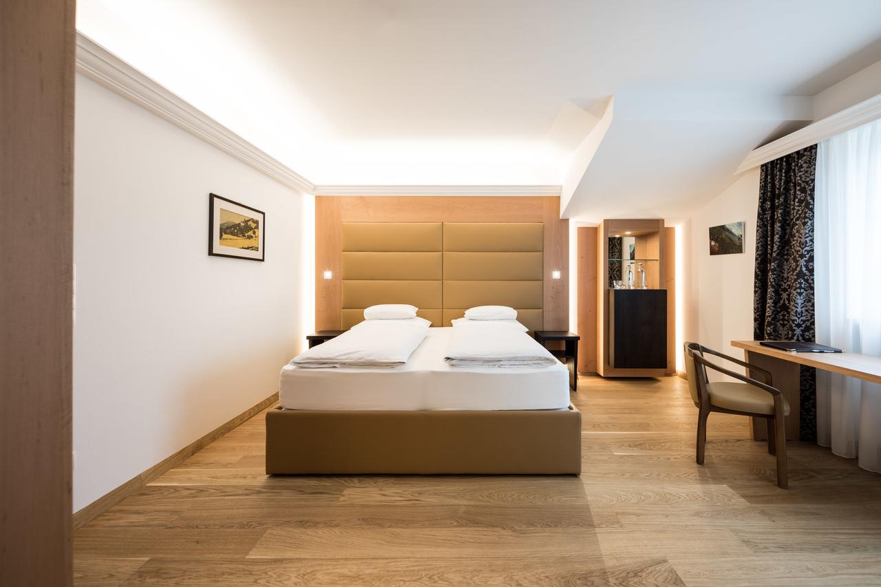 Double bedroom at the Haus am Hang. Book your stay at the Haus am Hang here. A Must-Read Guide to Summer in South Tyrol.