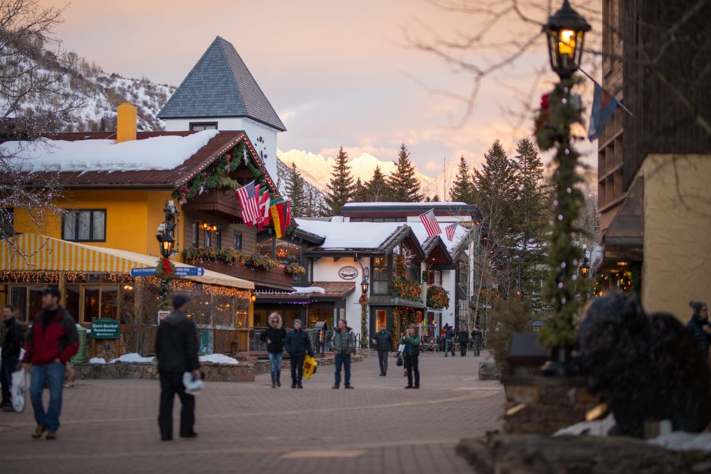 Vail's iconic village with the Gore Range Mountains capturing the sunset in Vail, CO. Photo- Craig Orsini, Vail Resorts. The Must-Read Guide to Vail.