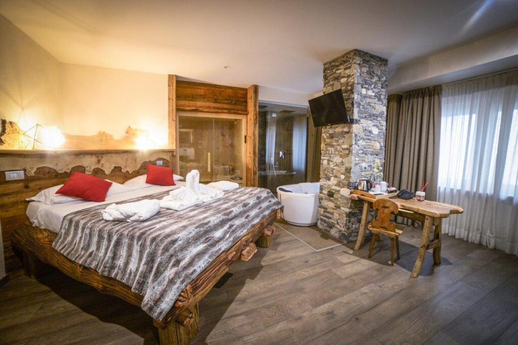 The premium suite at the Hotel Serendipity has a hot tub bath in the room. Book your stay at the Hotel Serendipity here. How Italian Ski Resorts are preparing for the ski season.