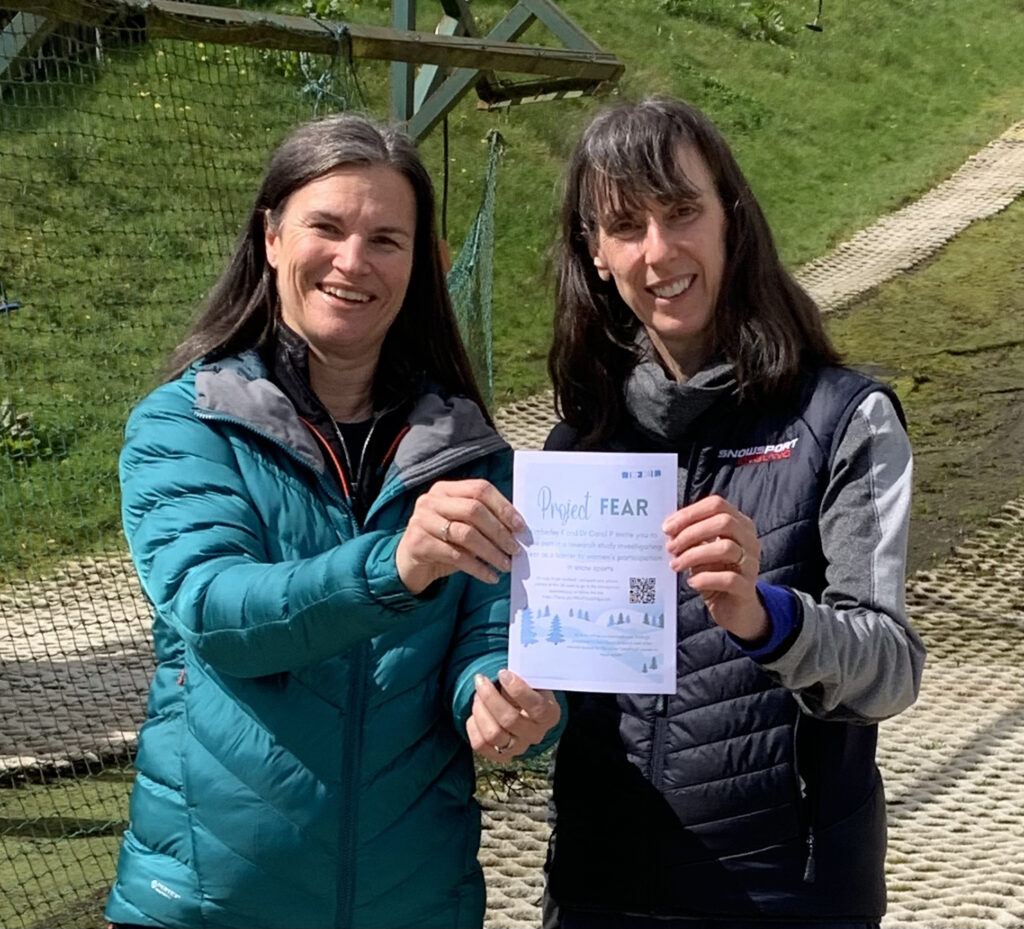 Kimberly Kay and Dr Carol Porter pose with the flyer of their study. Photo courtesy Ski Press