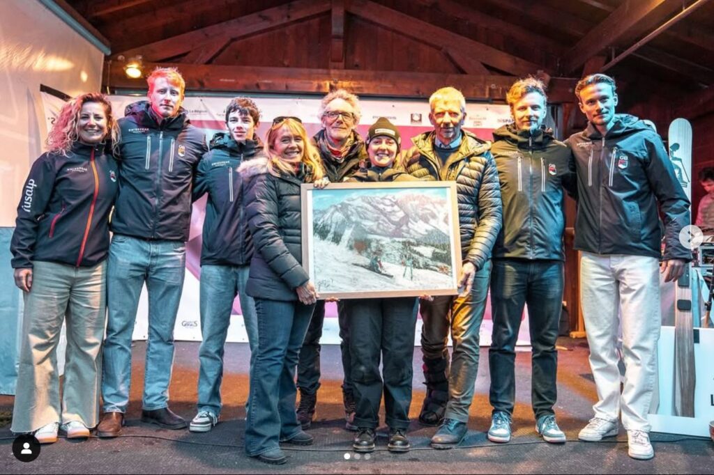 Jaz Taylor giving her painting to her long-time sponsor Leggett Immobilier at the Telemark World Cup in Les Contamines-Montjoie. Photo courtesy Jaz Taylor. 